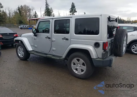 2011 Jeep Wrangler Unlimited Sahara из США, поврежденный, VIN 1J4BA5H14BL521928